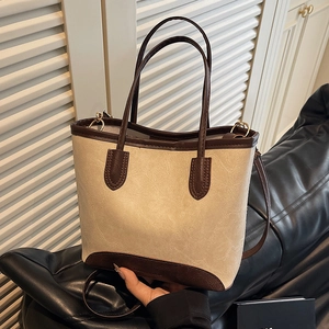 Vintage patchwork tote bag with lychee texture and slim straps for versatile styling