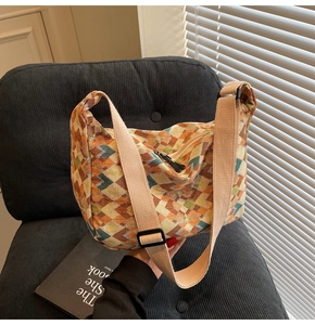 Detail of bohemian jacquard fabric with geometric patterns and adjustable wide strap
