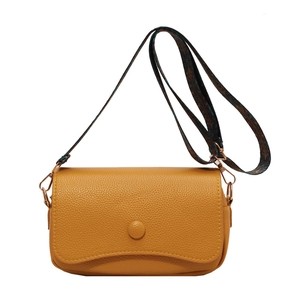 Retro yellow pebbled leather crossbody bag with decorative floral wide strap
