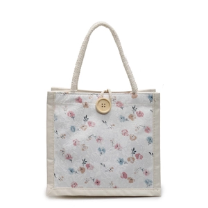 Floral canvas tote bag with white lace overlay and rustic cotton rope handles