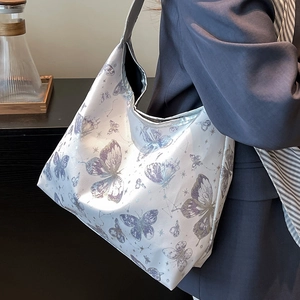 Grande borsa a spalla bianca con stampe artistiche di farfalle e costellazioni