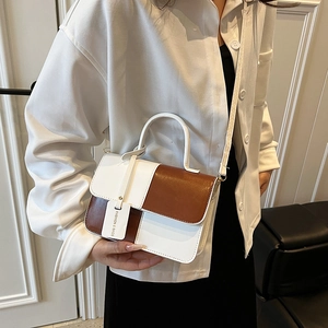 Chic two-tone contrast small square bag in white and brown leather on model
