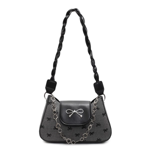 Minimalist grey bow-patterned shoulder bag with silver charm and braided strap