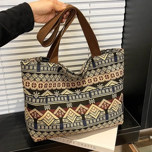 Ethnic style large capacity canvas tote bag with geometric patterns and brown handles