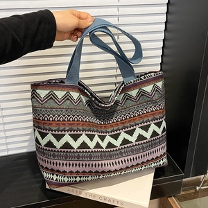 Ethnic pattern woven tote bag with large capacity and blue straps for summer style