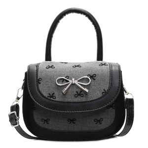 Bow embroidered saddle bag with metal bow detail and adjustable shoulder strap