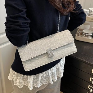 Silver glitter square crossbody bag with metallic chain strap and geometric lock buckle
