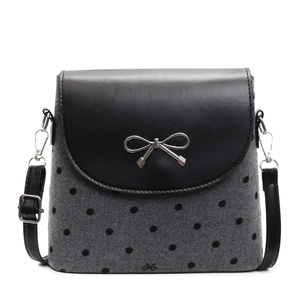 Chic polka dot bucket bag with silver bow ornament and adjustable crossbody strap
