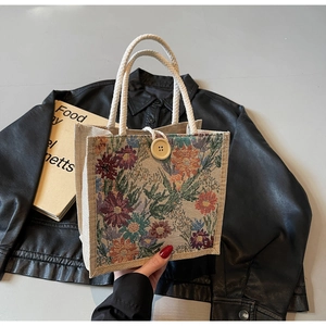 Linen tote bag with vintage floral print, rope handle and wooden button detail