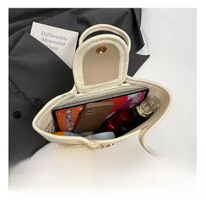 Detail of spacious hand-woven tote bag showing large interior capacity for essentials