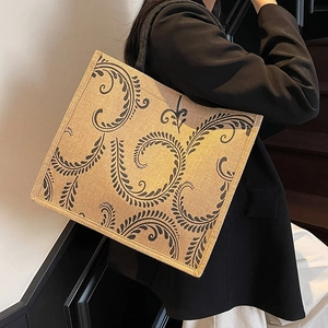 Large linen tote bag with black scroll pattern and long straps for women's fashion