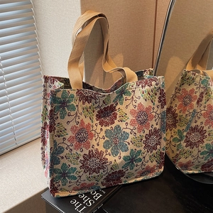 Ethnic floral embroidered tote bag with large capacity and durable woven handles