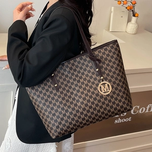 Brown monogram tote bag with large capacity and golden M pendant for office commuting
