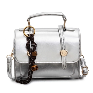 Silver glossy square crossbody bag with vintage charm and woven bell pendant detail