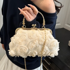 Elegant cream chain bag with 3D mesh roses and golden handle for evening wear