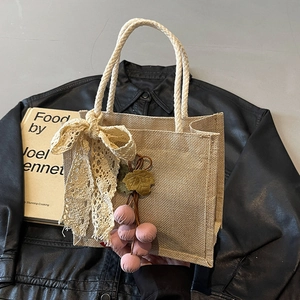 Retro linen lunch tote with lace bow and berry charm for casual summer fashion