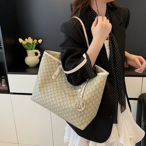 Women's chic beige monogram tote bag with large capacity and lettered charm