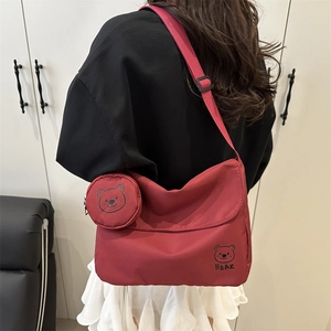 Burgundy canvas messenger bag with cartoon bear print and small round coin purse set