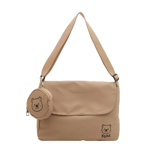 Khaki nylon messenger bag with bear print and small round coin purse accessory