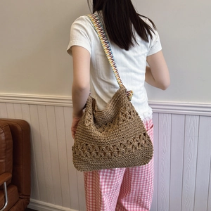 Large woven hobo bag with hollow flower patterns and bohemian colorful shoulder strap