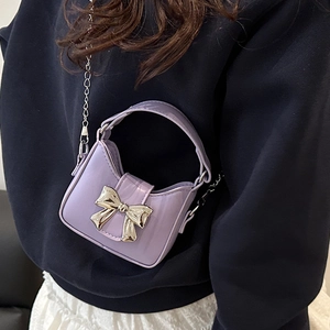 Mini lavender patent leather bow crossbody bag with silver chain strap for women