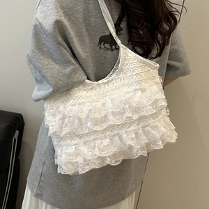 White multi-layer lace tote bag for women showing ruffled details and casual shoulder style