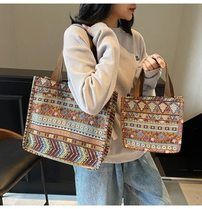 Detail of bohemian tote bag set with vibrant geometric patterns and woven texture