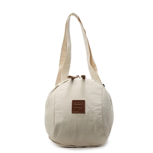 Sac à dos en toile blanc cassé minimaliste avec écusson en cuir marron et fermeture éclair