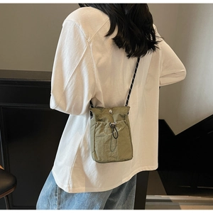 Olive green nylon crossbody phone bag with drawstring and adjustable woven rope strap