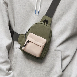Army green and beige waterproof nylon crossbody bag with adjustable wide strap for women