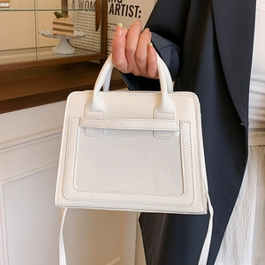Sac à main carré blanc élégant avec poche frontale transparente et poignée supérieure