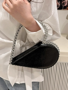 Black heart-shaped evening bag with a luxury rhinestone-studded handle for women