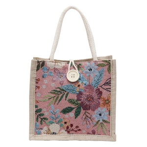 Tragetasche aus Baumwolle und Leinen mit rosa Blumenmuster und geflochtenem Griff