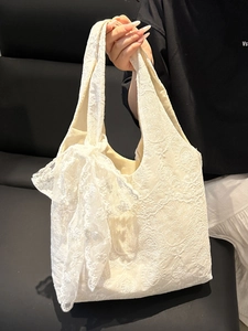 Elegant white lace tote bag with floral embroidery and large bow detail for women