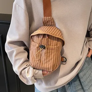 Japanese style checkered canvas crossbody bag with drawstring and brown nylon strap