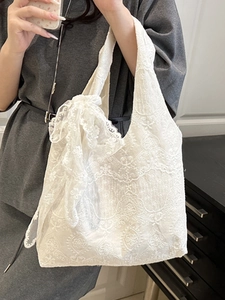 Elegant white lace tote bag with large bow detail for women, perfect for summer daily use