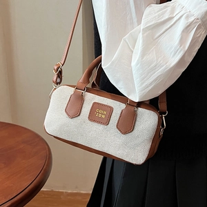 Retro Boston barrel bag in beige canvas and brown leather with top handle and strap