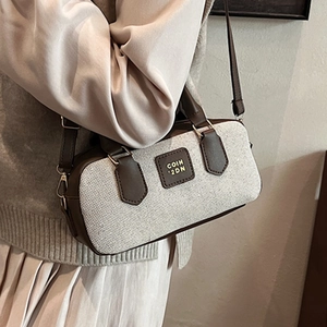 Retro Boston handbag in beige canvas and brown leather trim with crossbody strap