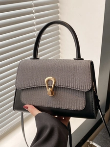 Women's woven texture leather shoulder bag with gold hardware and top handle
