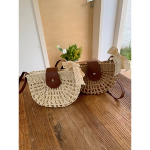 Hollow Out Straw Woven Crossbody Bag For Women Semi Circle Saddle Shoulder Bag With PU Leather Flap Lace Bow Vacation Beach Bag