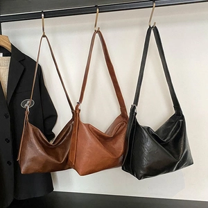 Retro large capacity tote bag for women in dark brown, caramel, and black colors