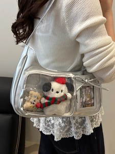 Sac à bandoulière argenté métallisé avec fenêtre en PVC et peluche à l'intérieur