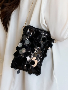 Chic black sequin crossbody tote bag with silver polka dot accents and gold chain strap