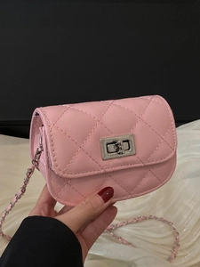 Pink quilted mini chain bag for women featuring silver turn-lock and leather chain strap