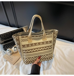Macro detail of geometric patterned canvas tote with sturdy woven straps for urban commute