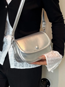 Silver metallic textured mini flap crossbody bag with adjustable long shoulder strap