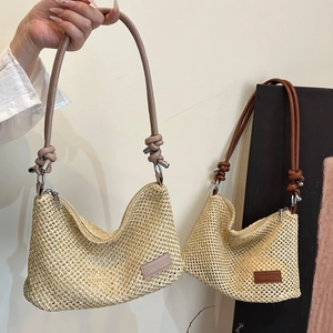 Minimalist woven straw shoulder bag for commuting with leather straps in two colors