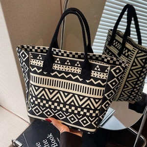 Canvas tote bag with black and white bohemian geometric patterns for daily commuting