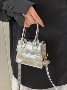 Metallic silver crocodile embossed mini handbag with dual top handles and gold-tone hooks