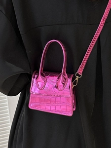 Metallic hot pink mini handbag with crocodile texture and gold hardware for women